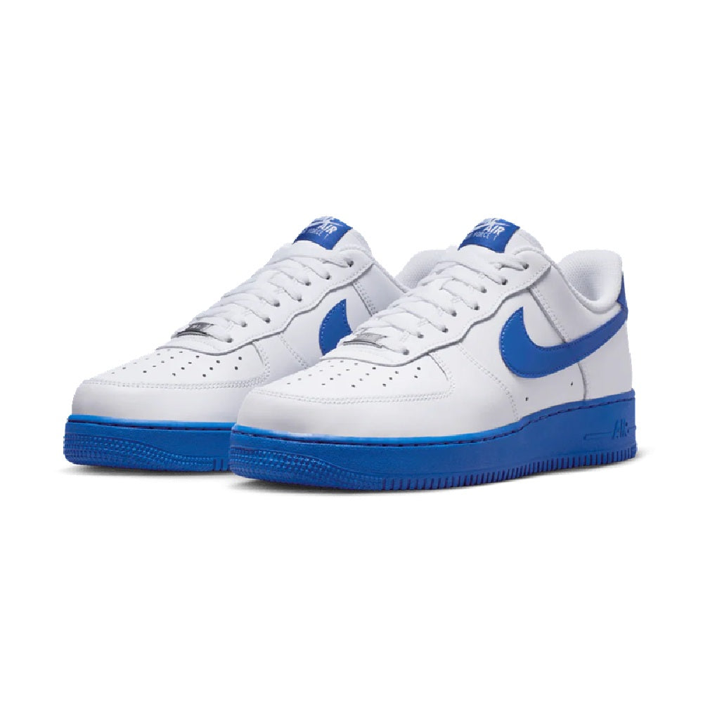Pair of Air Force 1 '07 sneakers, white leather uppers with blue Nike swoosh.