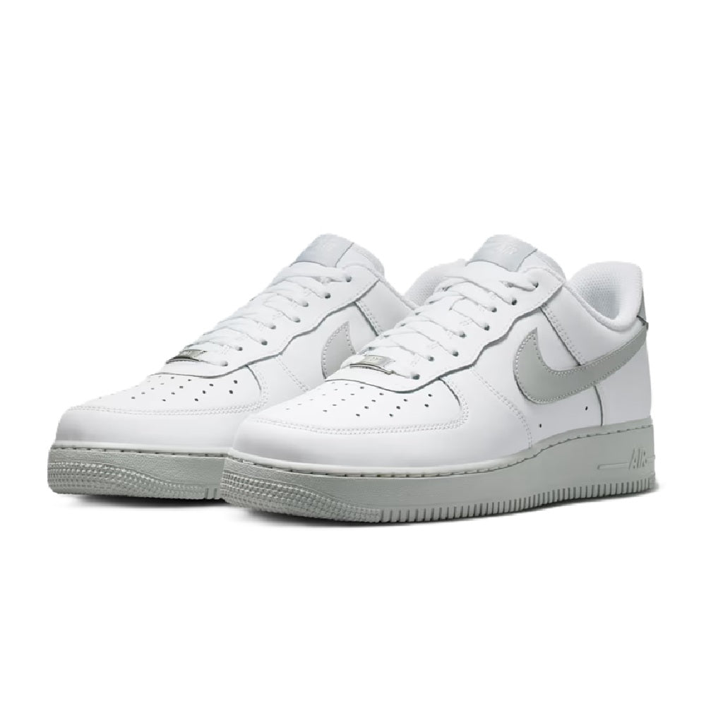 Nike low-top Air sneaker, toe and lace detail, white leather with gray Swoosh