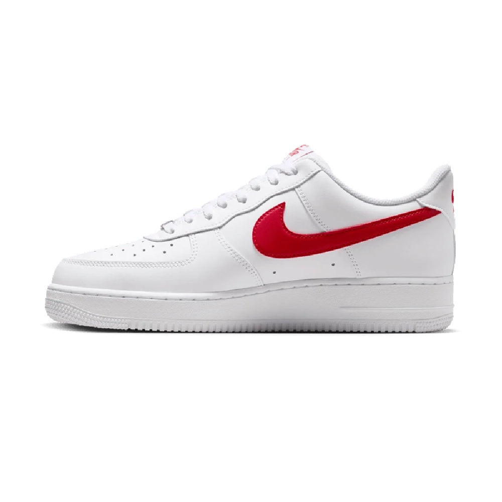 Nike Air Force 1 low-top sneakers, white leather, red swoosh and lace-up front.