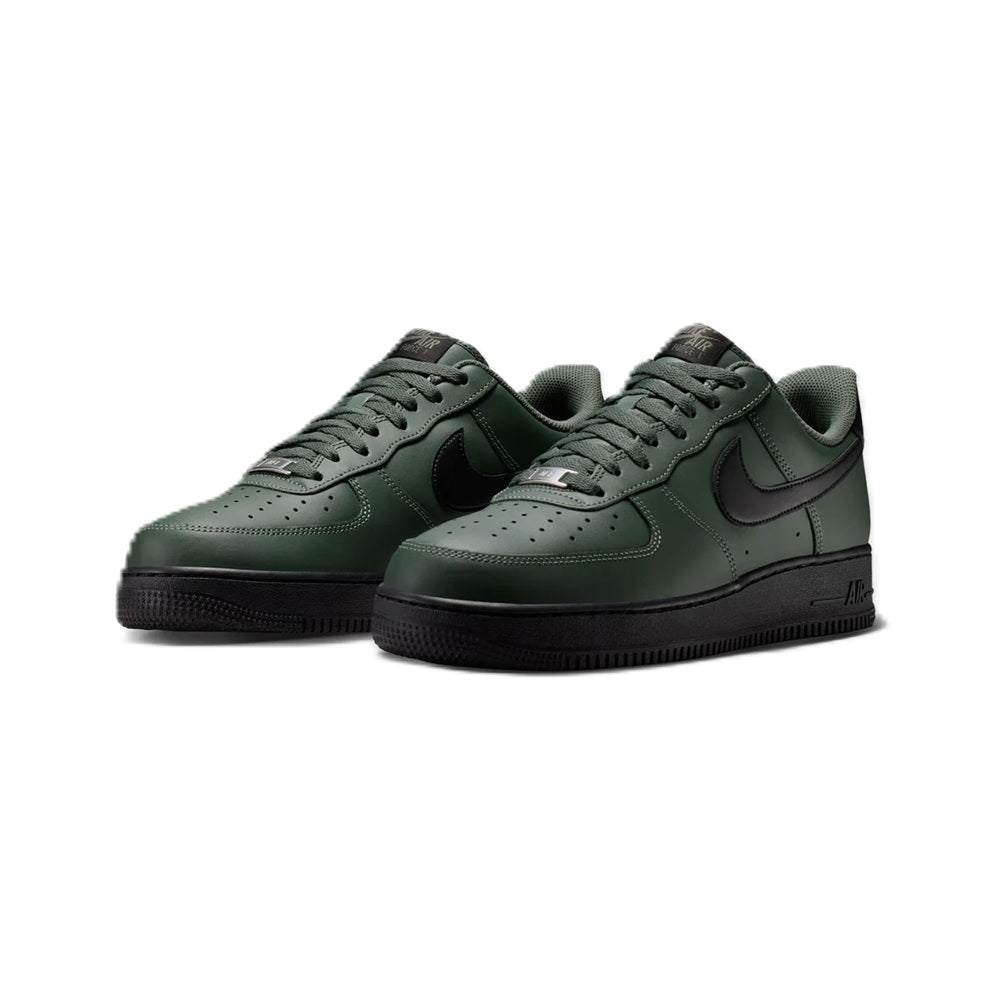 Pair of Nike Air Force 1 low-top sneakers, green camo uppers with black toe and sole