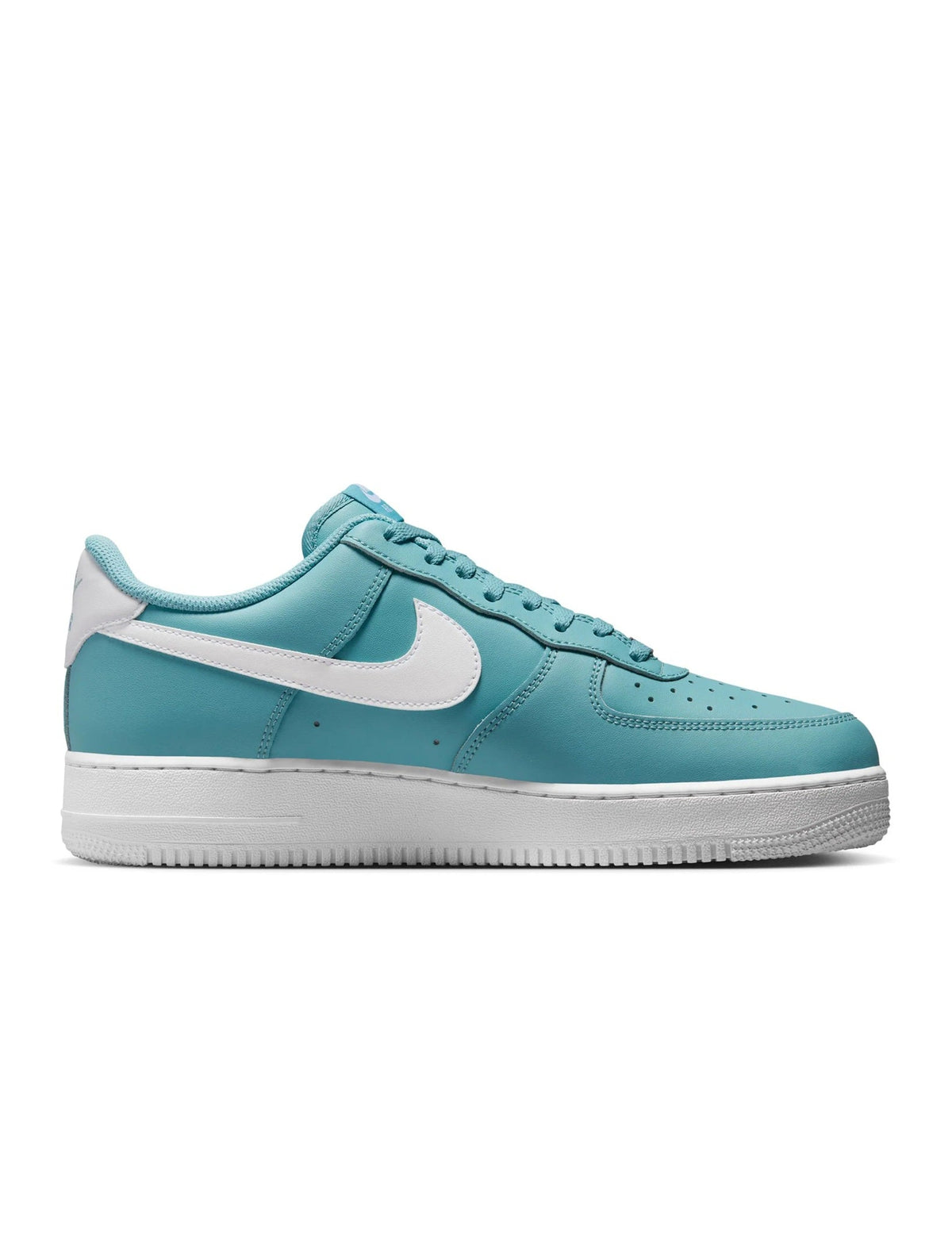 Turquoise low-top sneakers with white swoosh and lace-up front on white sole