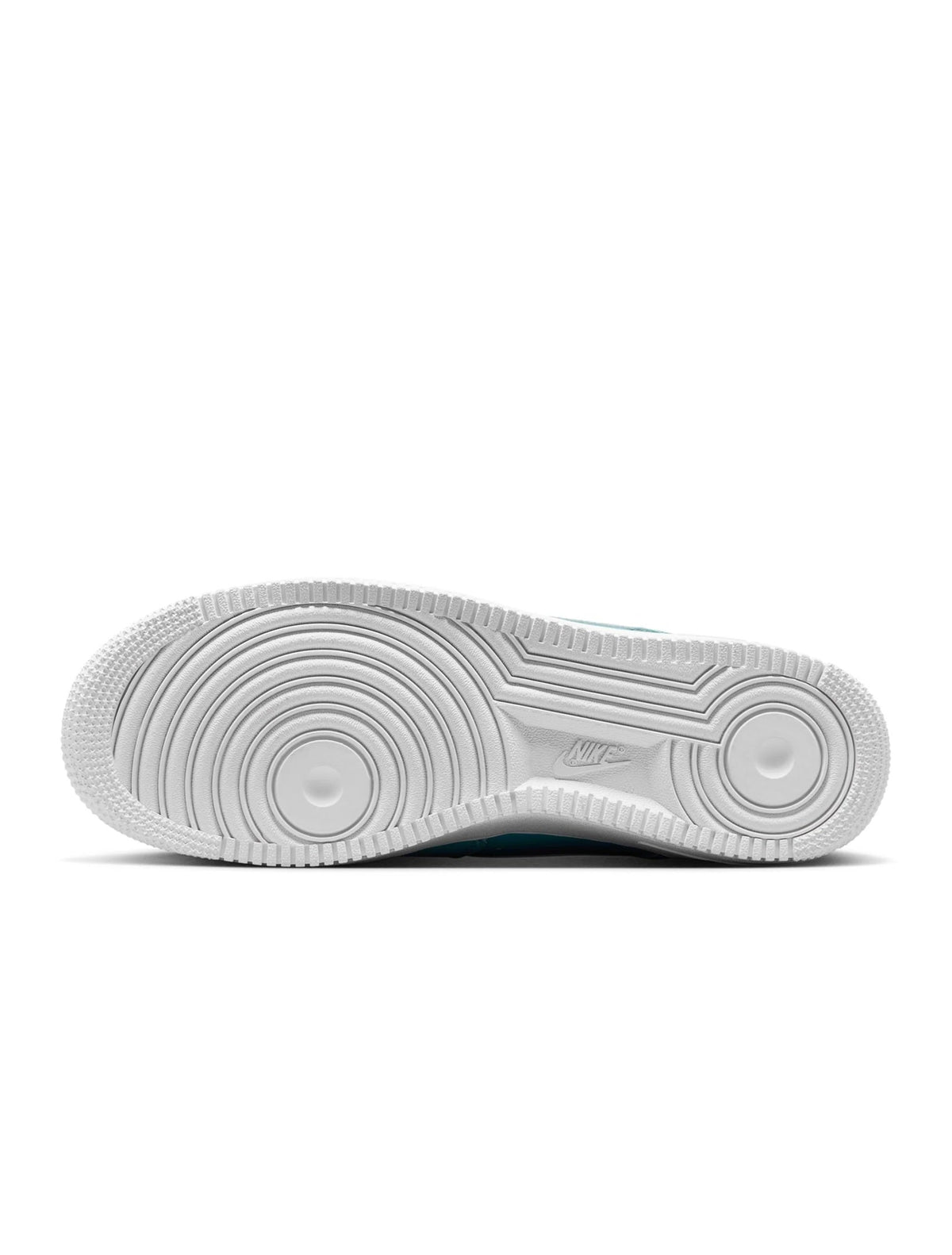 White rubber outsole with circular traction patterns