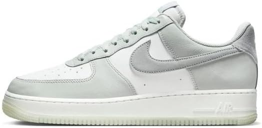 Nike Air Force 1 low-top sneakers in light silver/gray with lace-up and Swoosh.