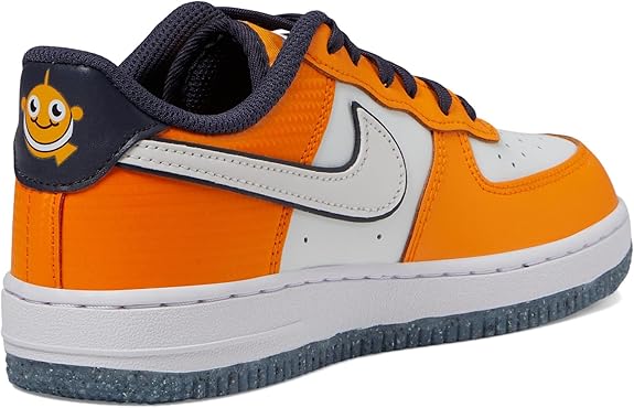 Kids' low-top sneakers with navy heel patch, orange overlays, white midsole, and laces