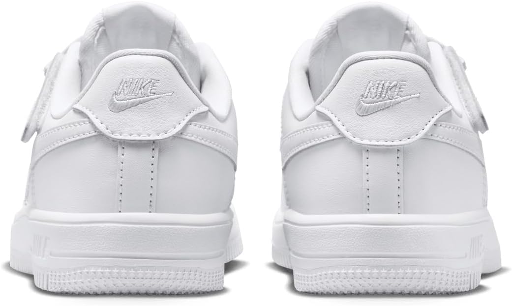 Kids' Nike sneakers, white heel-back view with EasyOn strap and swoosh