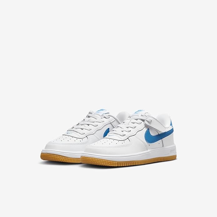 Pair of kids Nike Air Force 1 Low easy-on sneakers, white with blue accents and gum soles