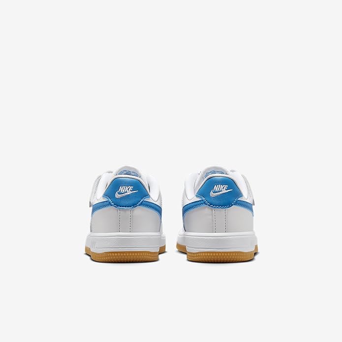 Kids Nike Air Force 1 Low easy-on sneakers, rear view with blue heel tab and gum sole