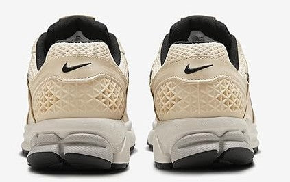 Women’s Nike Zoom Vomero 5 heel view shoes in pearl white/bone with black swoosh