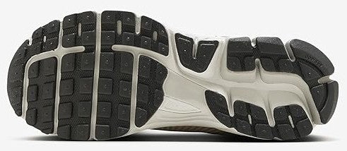 Nike Zoom Vomero 5 outsole view with grippy tread and light midsole base