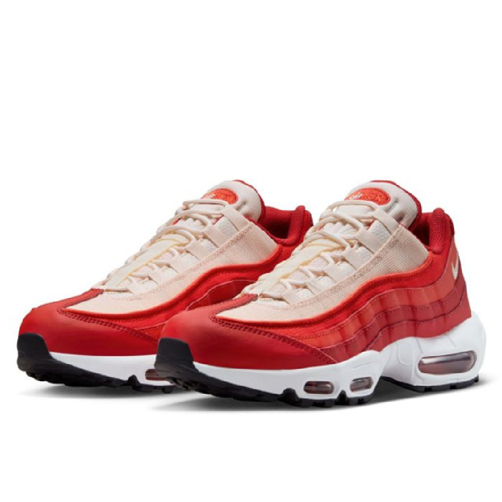 Nike Air Max 95 sneakers pair with red and light uppers, lace-up front, cushioned soles