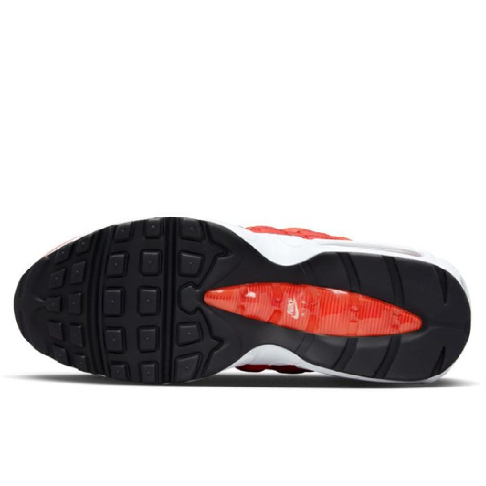 Nike Air Max 95 outsole with black traction tread and red-and-white underfoot panel