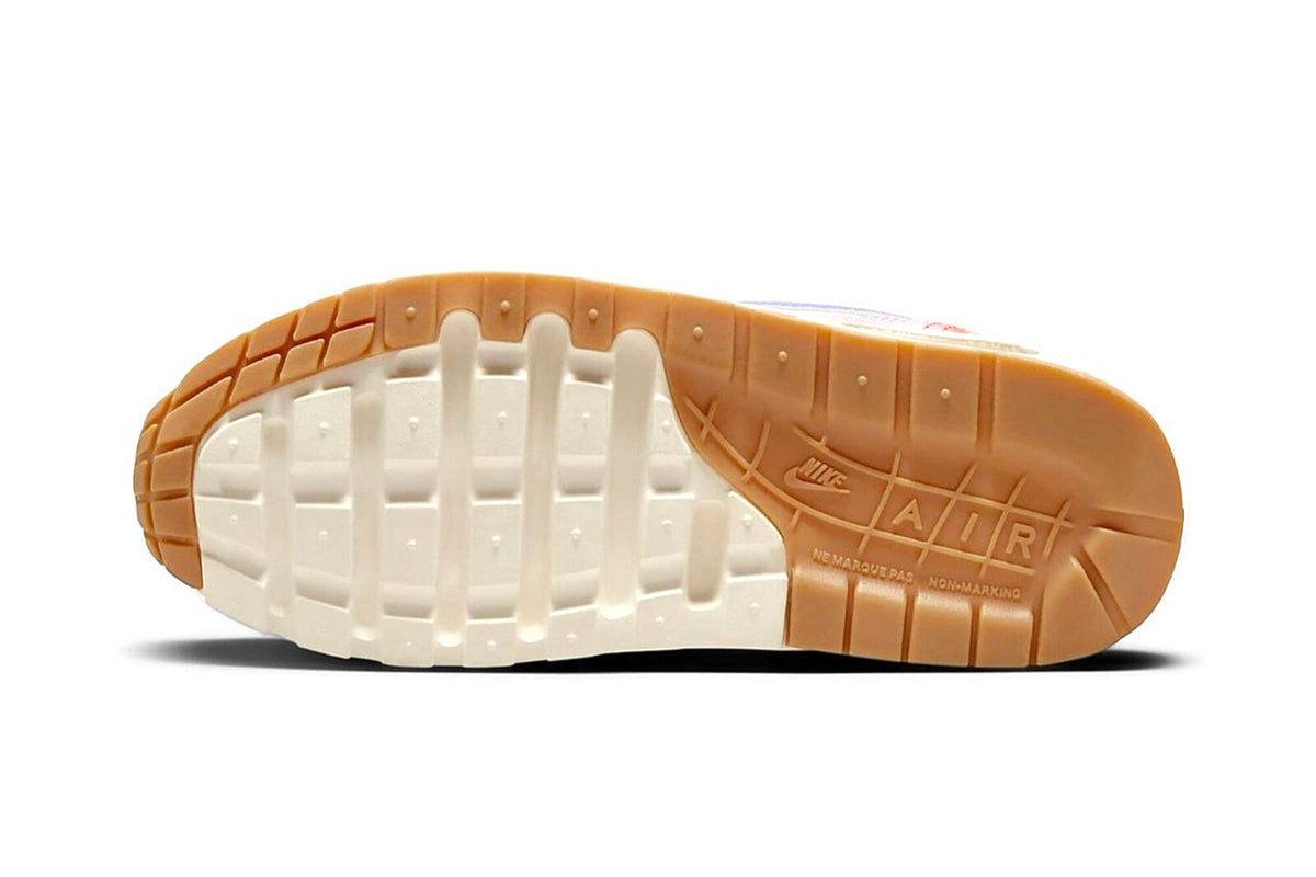Kids' Nike Air Max 1 tan rubber outsole with AIR text