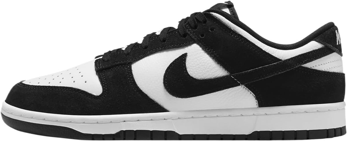 Black and white Nike Dunk Low sneakers, side view with swoosh and laces