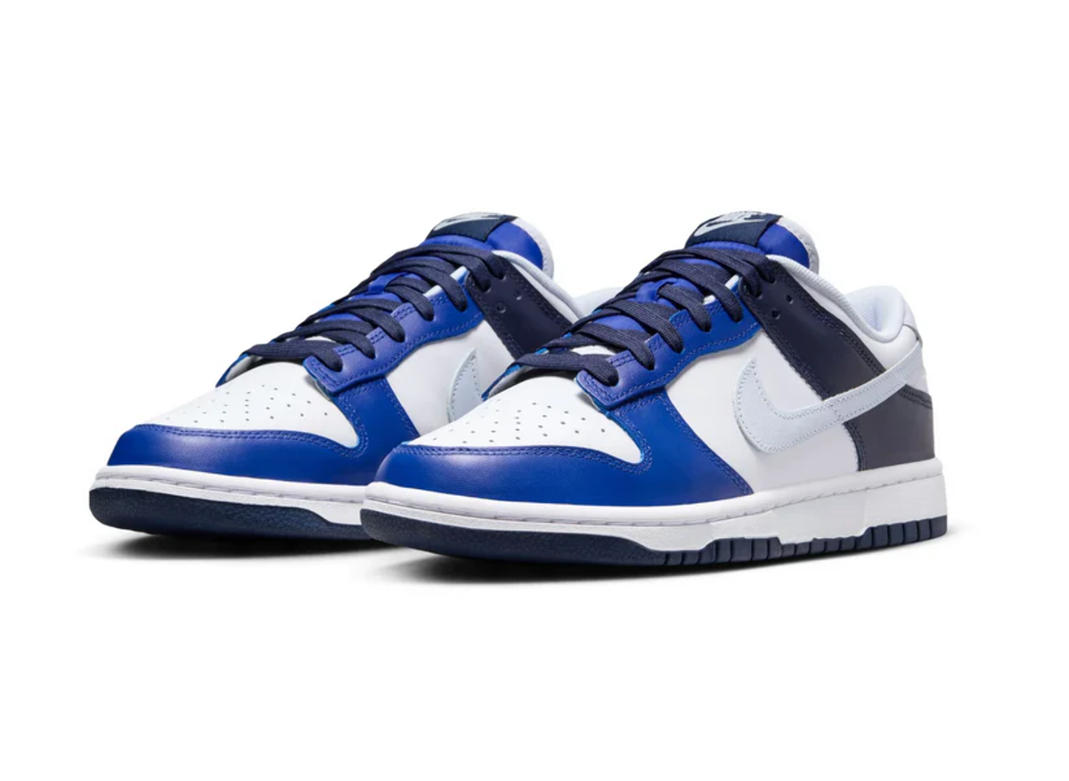 Blue and white Nike Dunk Low low-top sneakers, dark navy accents