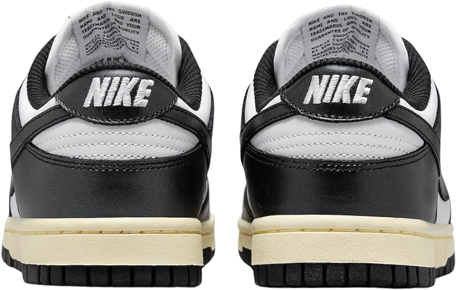 Nike Dunk Low PRM sneakers, rear view with black heel panels and Nike branding