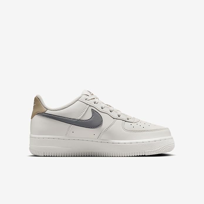 Kids' Nike Air Force 1 sneaker, side view, white leather with gray swoosh and tan collar