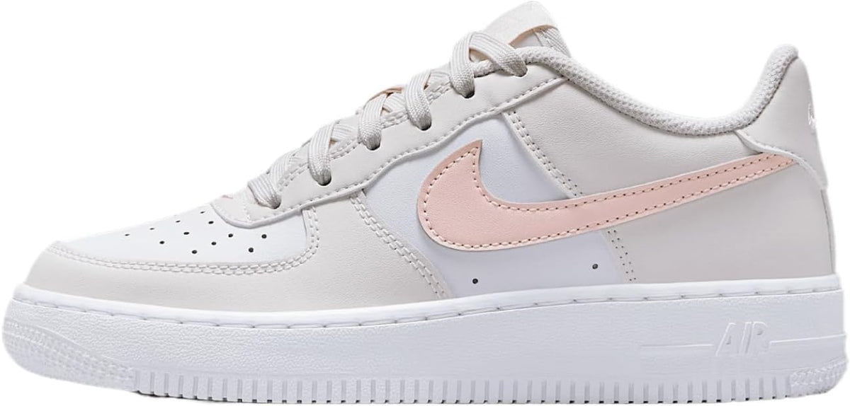 Big Kid's Nike Air Force 1 low sneakers, white with pink swoosh accents