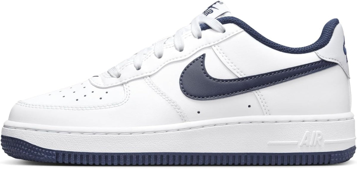 Big kid's Nike Air Force 1 low-top sneakers in white with navy accents