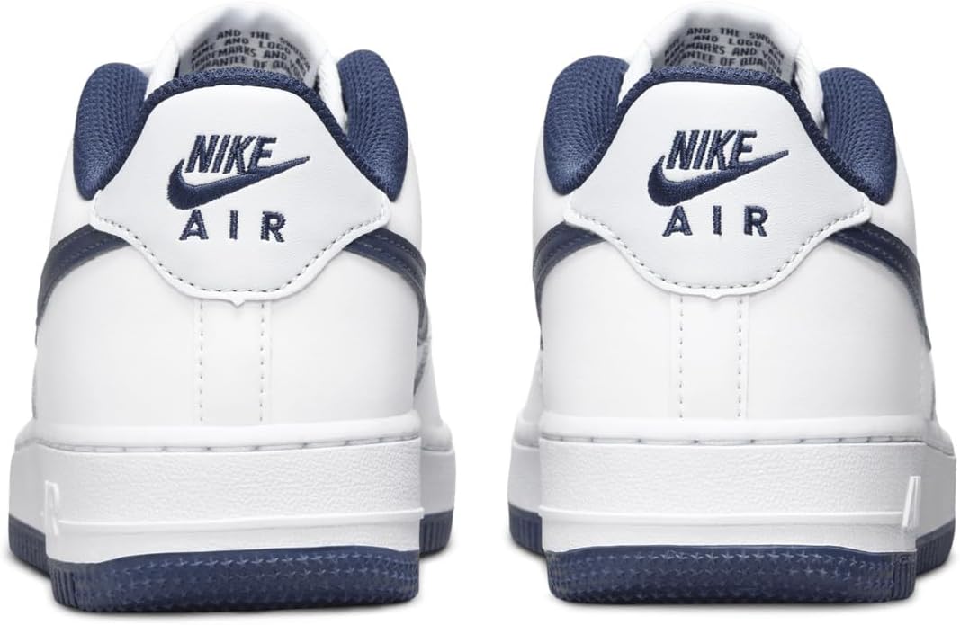 Big kid's Nike Air Force 1 low-top sneakers, white with navy heel and Air logo