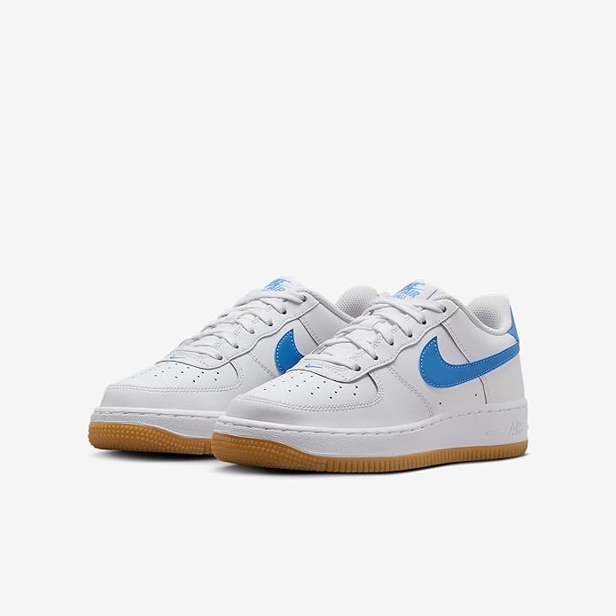 Kids' Air Force 1 low-top sneakers, pair view, white leather with blue Swoosh accents