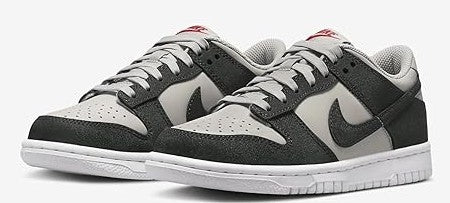 Nike Dunk Low sneaker pair, lace-up in black, gray, and white with swoosh