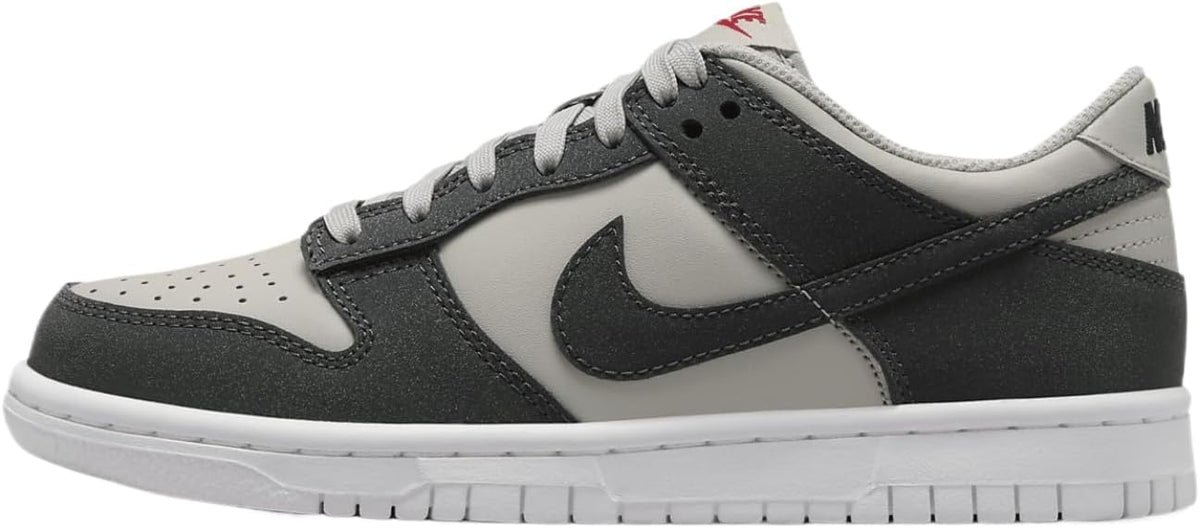 Nike Dunk Low sneakers for big kids, black and white leather with swoosh and laces