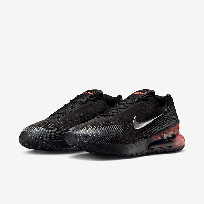 Black lace-up running sneakers with Nike Swoosh and red Air Max midsole unit