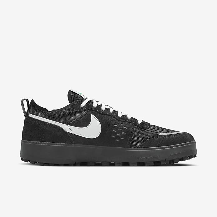Black Nike lace-up sneakers with white swoosh and textured upper, chunky sole