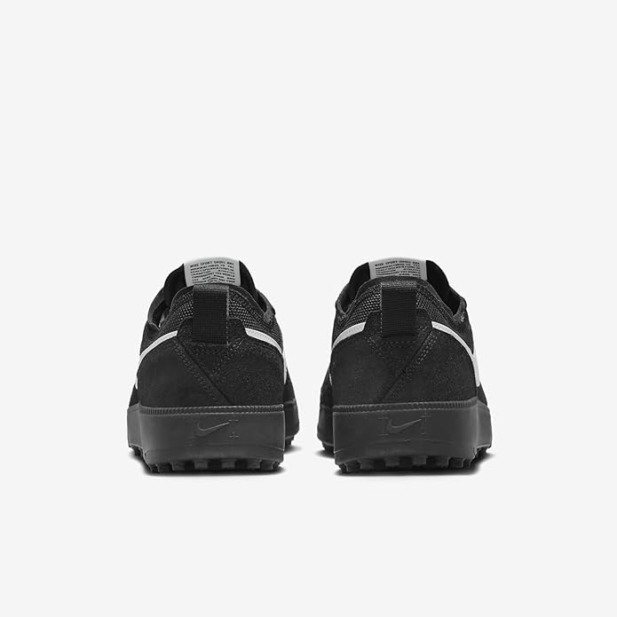 Pair of black Nike C1TY sneakers, rear view with padded collar and heel tab