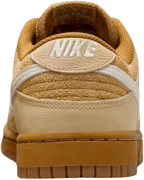 Men's Nike Dunk Low retro heel with Nike patch, padded collar, and tan rubber sole.