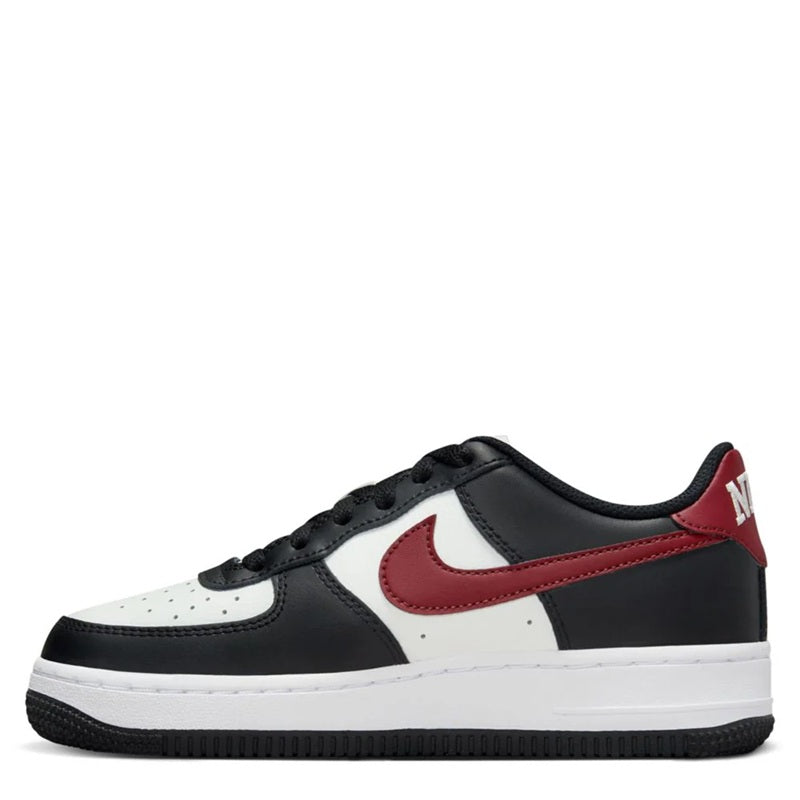 Kids' Nike Air Force 1 low-top sneaker, black with white toe and dark red swoosh detail.