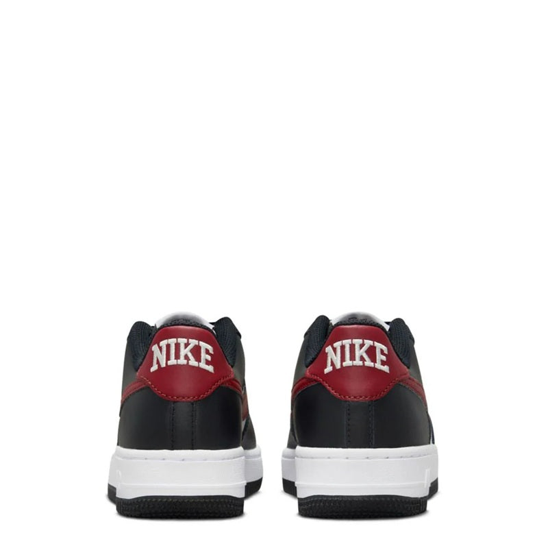 Kids' Nike Air Force 1 low-top sneakers, black uppers with dark red heel tab and white sole.