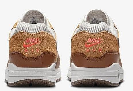 Nike Air Max 1 heel view in light bone with brown suede and red Air logo