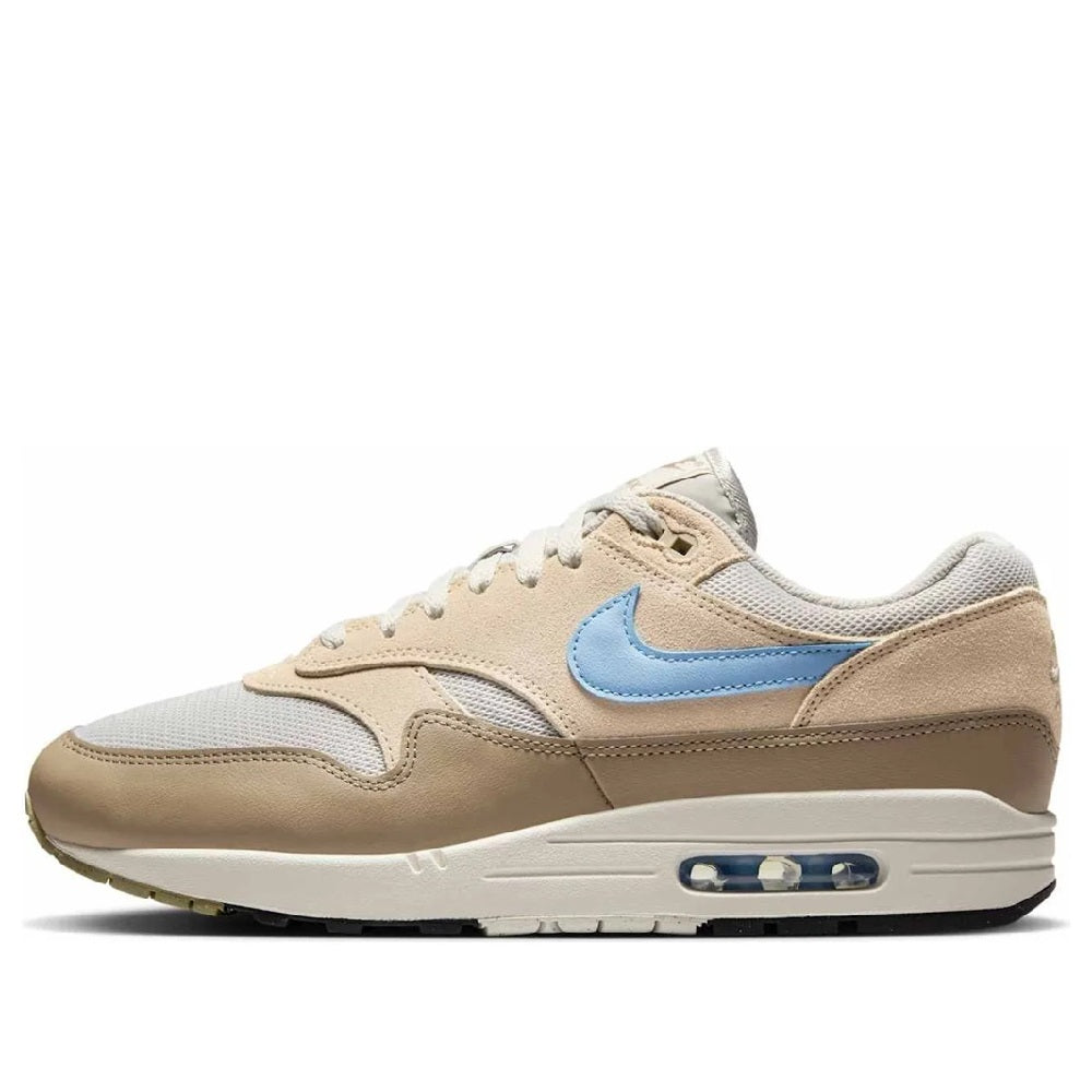 Men's Nike Air Max 1 ESS sneakers, light bone with blue swoosh and visible air unit