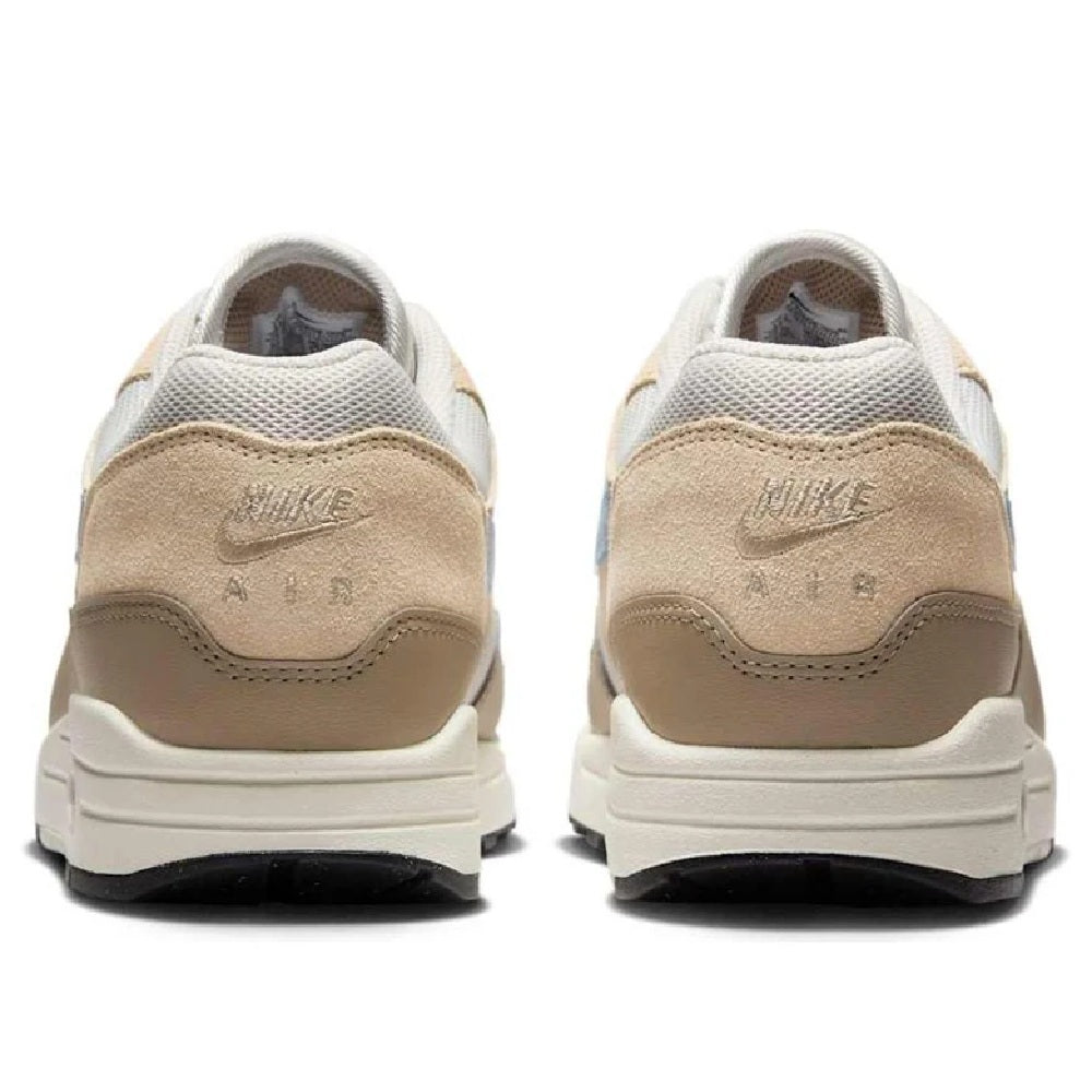Men's Nike Air Max 1 ESS sneakers, heel view; light bone suede with cushioned collar