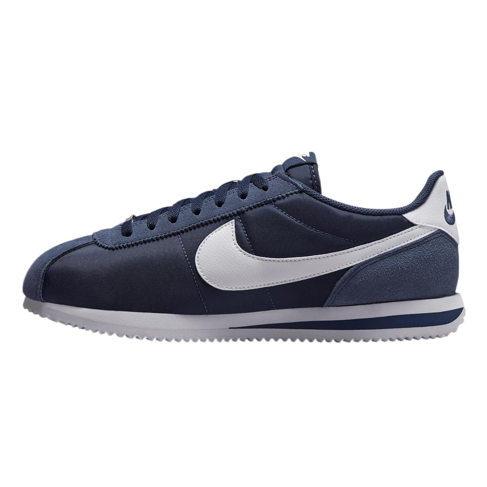 Men's Nike Cortez TXT sneakers side view in dark navy with white Swoosh and laces