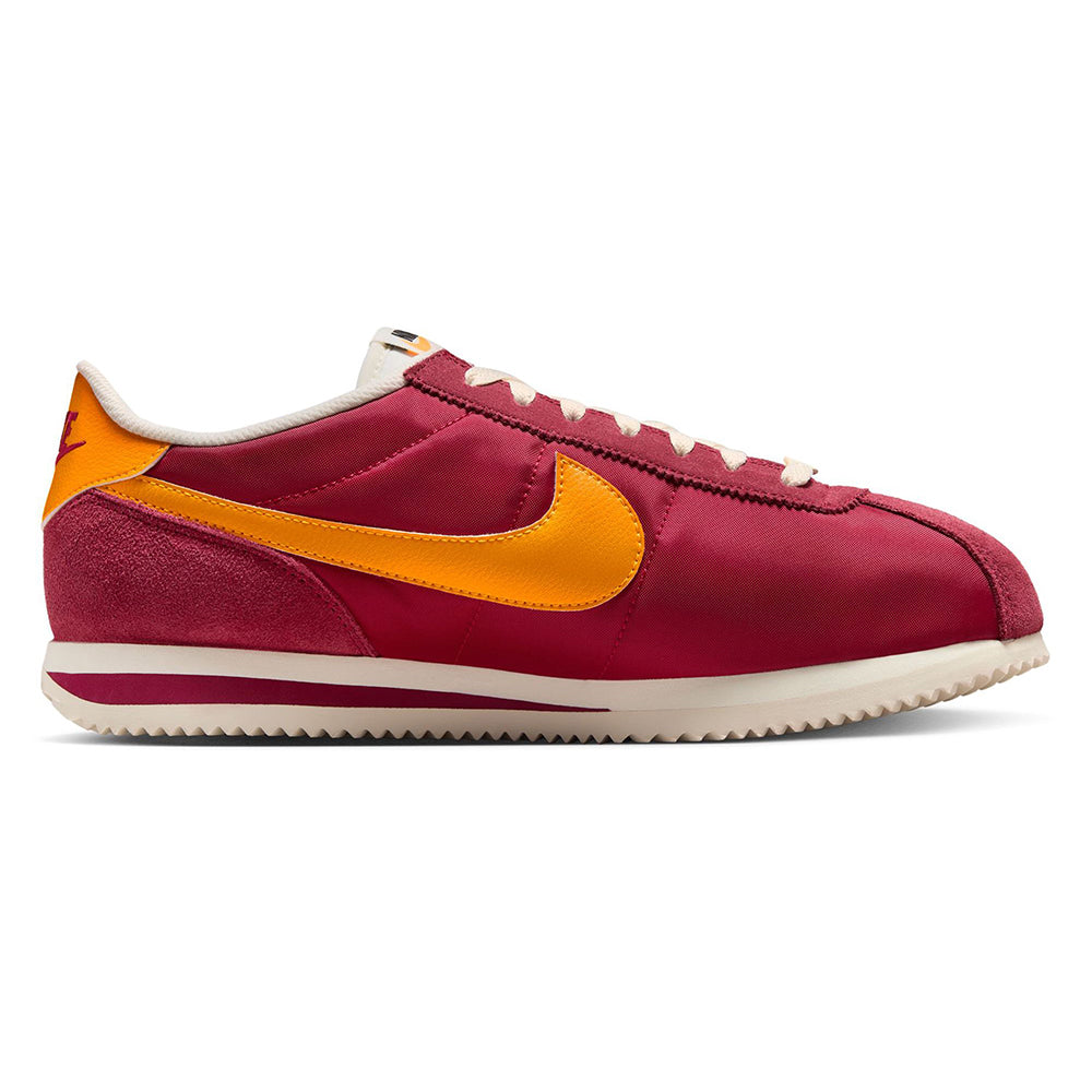 Men's Nike Cortez TXT low-top sneakers in maroon with yellow swoosh and white sole