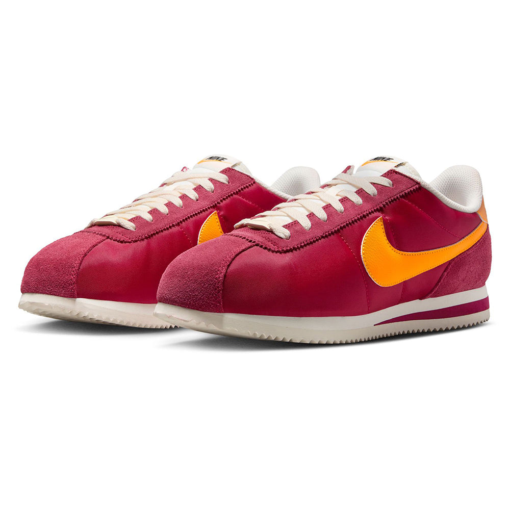 Men's Nike Cortez TXT low-top sneakers, maroon suede with yellow swoosh and white laces