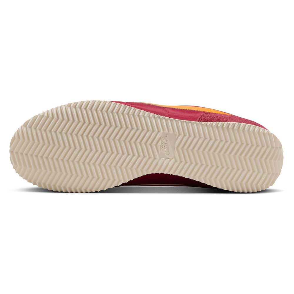 Nike Cortez TXT outsole view with cream zigzag traction and maroon shoe edge