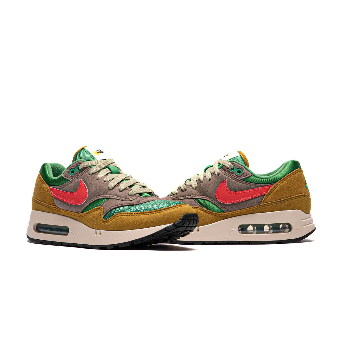 Air Max 1 PRM sneakers, paired side view; red swoosh, green and brown panels