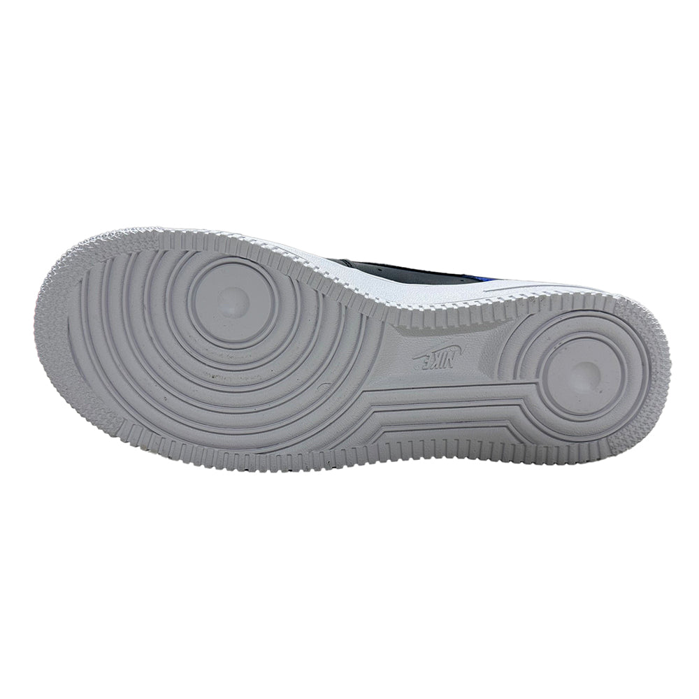 Big kid's Nike Air Force 1 LV8 outsole, light gray rubber tread with circular traction pods.