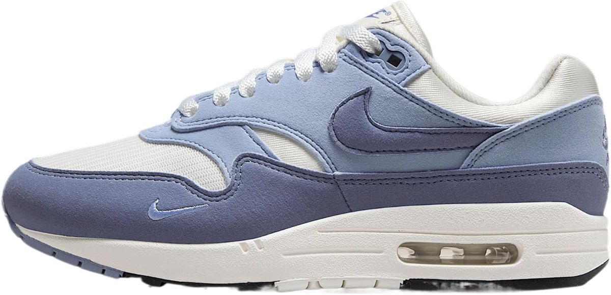 Nike Air Max 1 '87 sneakers with blue and sail panels, visible Air unit heel