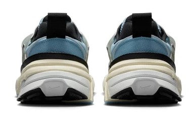Women's Nike V2K Run sneakers heels, black pull tabs with light blue and white soles