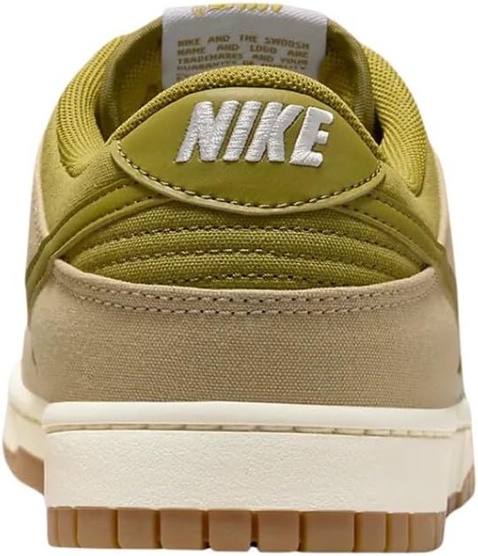Nike Dunk Low heel view with olive collar lining, cream upper, and gum sole.