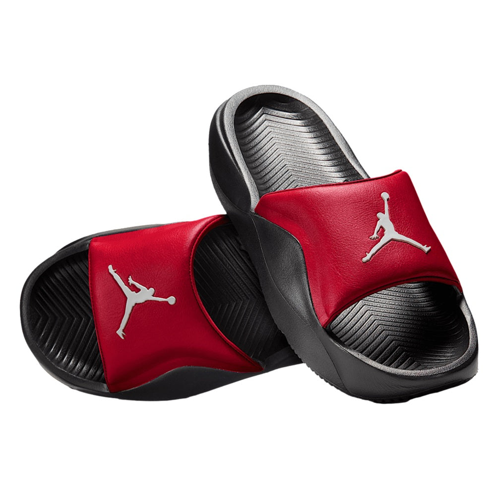 Kids red and black slide sandals with white Jumpman logo, open toe view