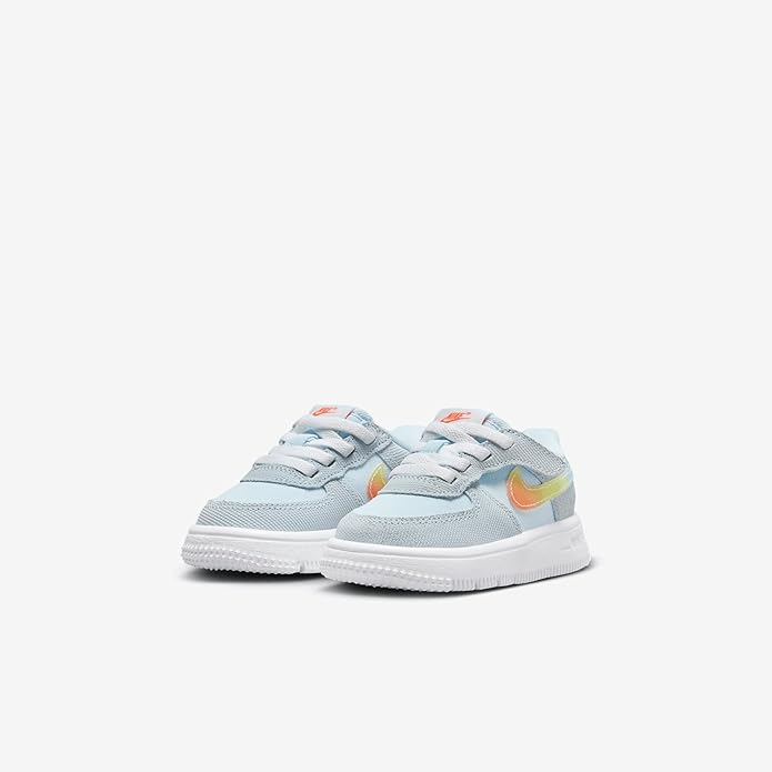 Toddler's light-blue Nike Air Force 1 Low sneakers, pair view with orange/yellow swoosh