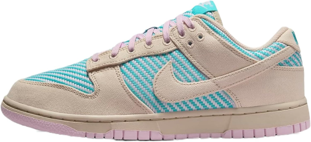 Women's Nike Dunk Low low-top sneakers in sand, teal and purple with textured panels.