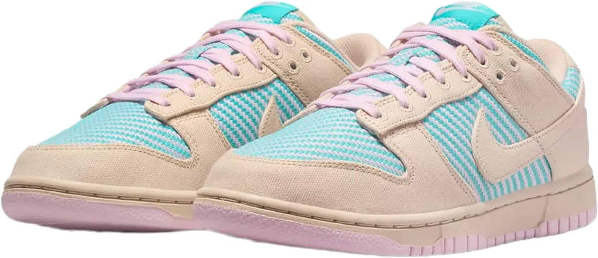 Women's Nike Dunk Low sneakers pair, sand and teal with purple lace trim, side profile.