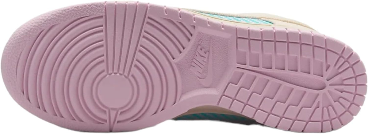 Women's Nike Dunk Low outsole, pink rubber tread with pivot-circle design.