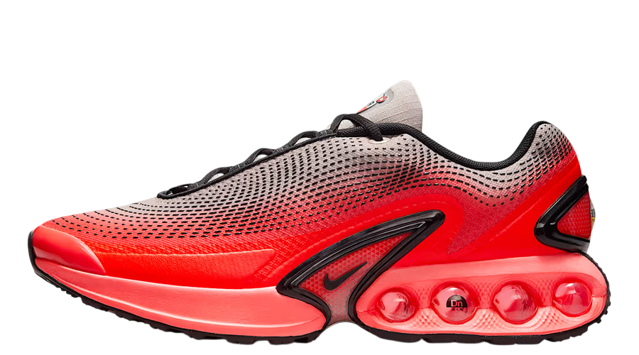 Men's Nike Air Max DN SE sneakers, red knit upper, black accents, visible Air cushioning
